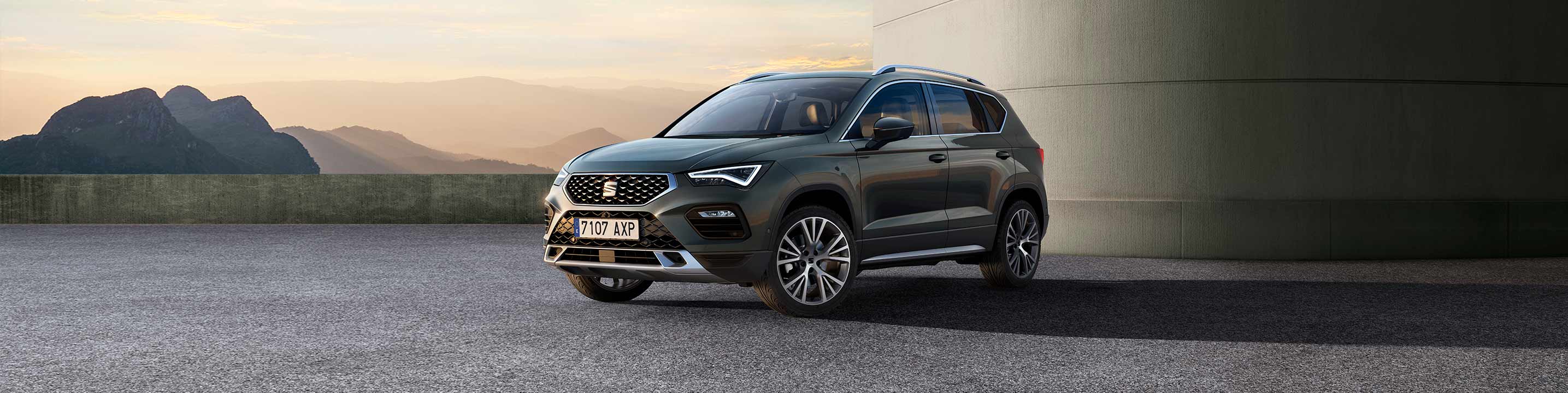 New SEAT Ateca in dark camouflage exterior front side view with reflex silver elements
